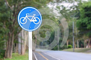 Bike path traffic sign blur background
