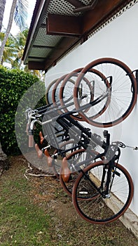 Bike rack with bikes on white wall