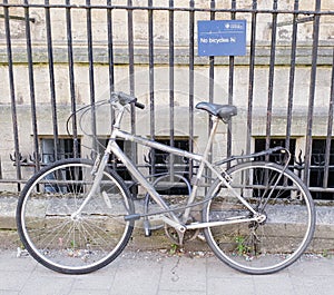Bike on railing, Oxford, England