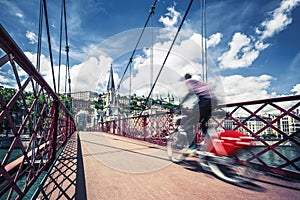 Bike on red footbridge