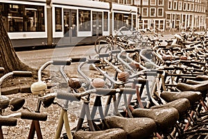A bike rental station on a rainy day in Amsterdam