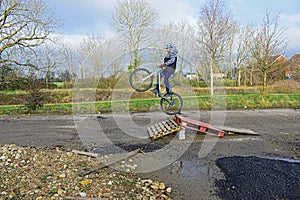 Bike Rider Jumping Makeshift Ramp