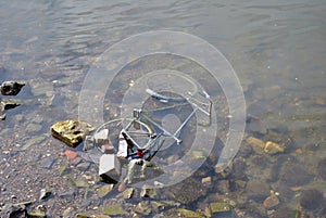 Bike in river - water pollution