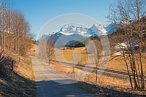 Bike route along railway from Garmisch to Mittenwald at early springtime