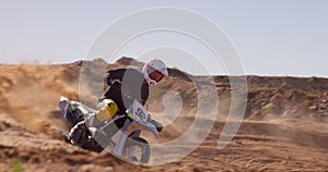 Bike, sand and sports with man off road for action, competition or performance on dirt track. Motorcycle, speed and