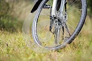 Bike tour, tyre of a bike outdoors, text space