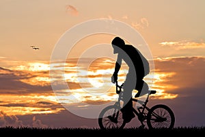 Bike trial at sunset photo
