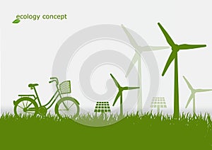 The bike ,windmill and solar panels on the grass ,Environmenta