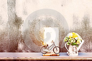 Bike wood and vases on wooden