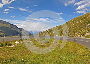 Biker on alpine road