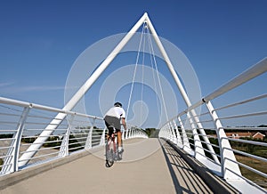 Biker on bridge