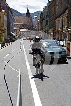 Biker and car on a restricted road