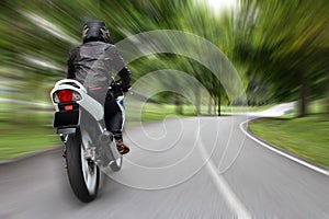 Biker on a country road