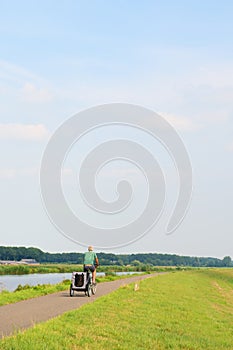 Biker with doggy car