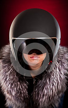 Biker girl in a helmet