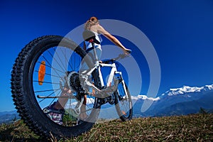 Biker-girl in Himalaya mountains