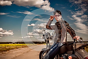 Biker girl on a motorcycle