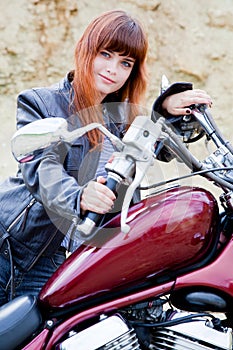 Biker girl on a motorcycle