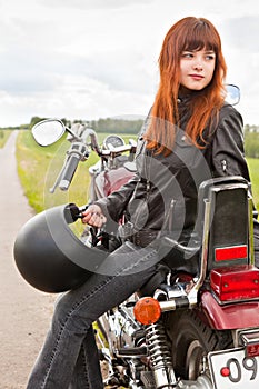 Biker girl on a motorcycle