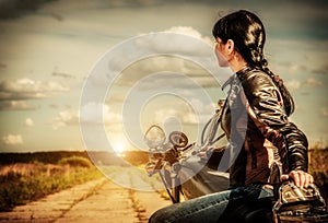 Biker girl on a motorcycle