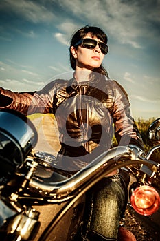 Biker girl on a motorcycle