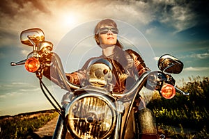 Biker girl on a motorcycle