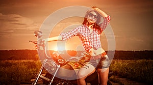 Biker girl and motorcycle