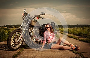 Biker girl and motorcycle