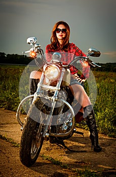 Biker girl and motorcycle