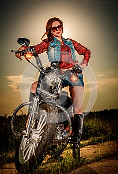 Biker girl and motorcycle