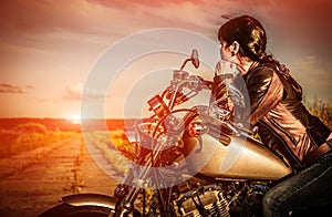 Biker girl on a motorcycle