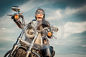 Biker girl on a motorcycle