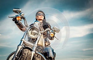 Biker girl on a motorcycle