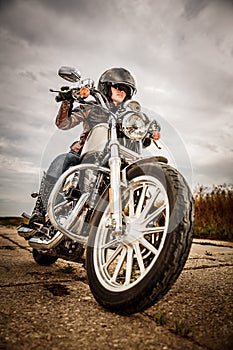 Biker girl on a motorcycle