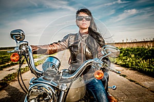 Biker girl on a motorcycle