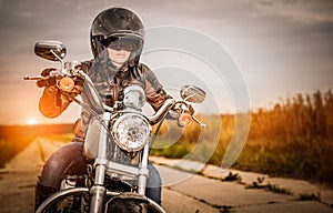 Biker girl on a motorcycle