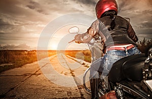 Biker girl on a motorcycle