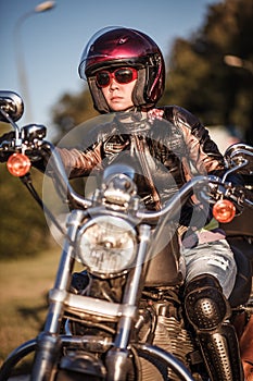 Biker girl on a motorcycle