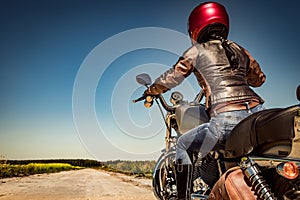 Biker girl on a motorcycle