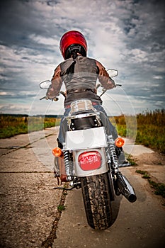 Biker girl on a motorcycle