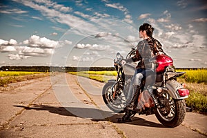 Biker girl on a motorcycle