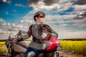 Biker girl on a motorcycle