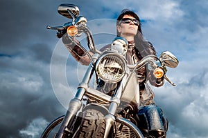 Biker girl on a motorcycle