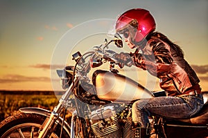 Biker girl on a motorcycle