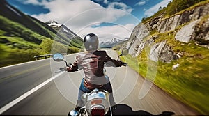 Biker girl rides a mountain road. First-person view