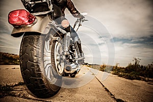 Biker girl riding on a motorcycle