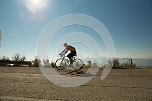 Biker ioannina city bike race in the morning uphill