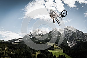 Biker jumps high with his bike