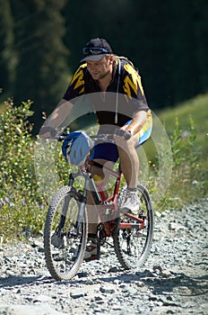 Biker on mountain road