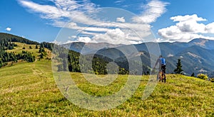 Biker on MTB bike at  mountains trail in Low Tatras mountains, Slovakia